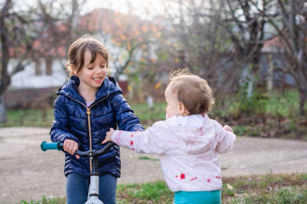 istock Kids playing in the yard. 1190369883