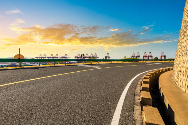 istock Asphalt road and beautiful sky at sunset 1190370641