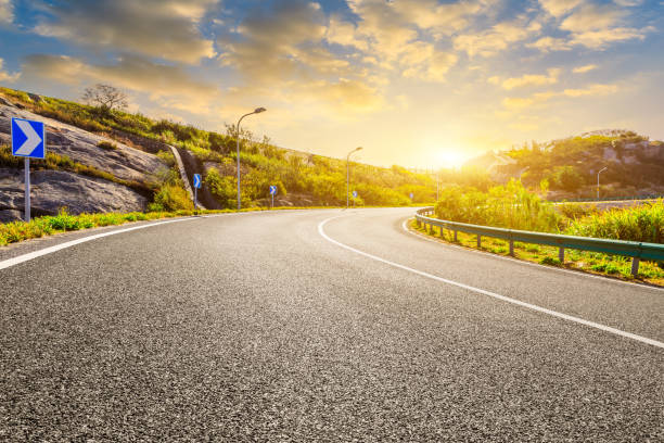istock Asphalt road and beautiful sky at sunset 1190370669