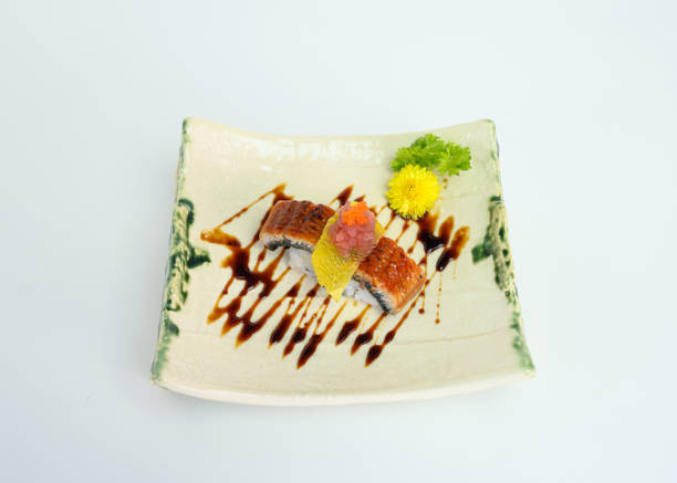 istock Smoked Unagi or eel red wine sauce sushi 1190373700