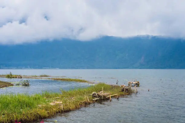 Photo of Amazing views of Lake Bratan and the mountains covered with clouds