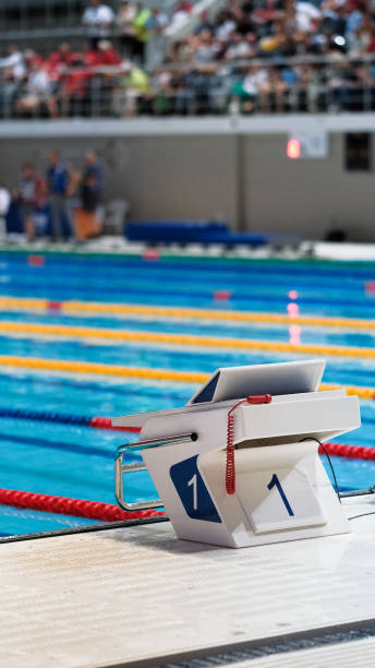 istock Swimming pool with starting block. Sport facility. Side view. 1190376088