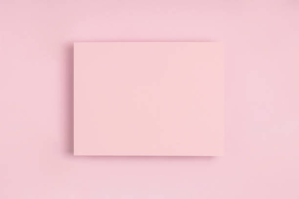 istock Minimal frame geometric composition mock up. Blank sheet of pink postcard on delicate pastel background. Template design invitation card. Top view, flat lay, copy space. Horizontal orientation. 1190378101
