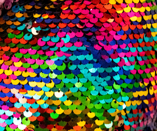 istock Decorative sparkling abstract background from multicolored sequins. Mermaid reversible texture material 1190378787