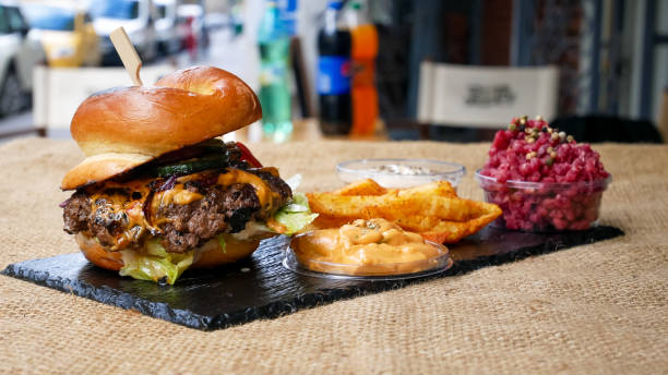 istock Meaty hamburger in a restaurant 1190380374