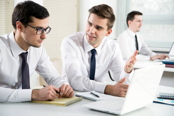 istock Businessmen working in an office 1190381822