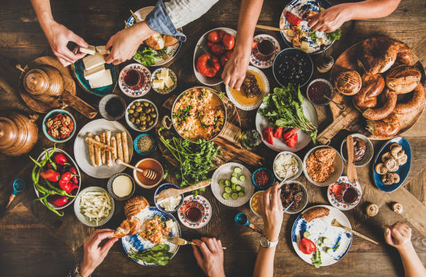 istock Traditional Turkish breakfast table and people taking various food 1190381895