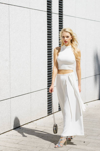 istock Woman wearing crop top and culottes 1190383232