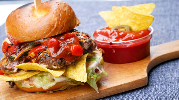istock Meaty hamburger in a restaurant 1190383499