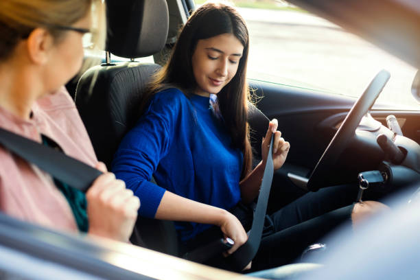 istock Teenager Having Driving Lesson With Female Instructor 1190383812