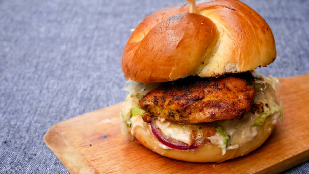 istock Meaty hamburger in a restaurant 1190383815