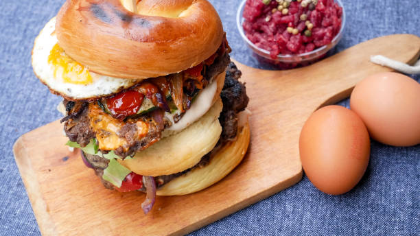 istock Meaty hamburger in a restaurant 1190383895