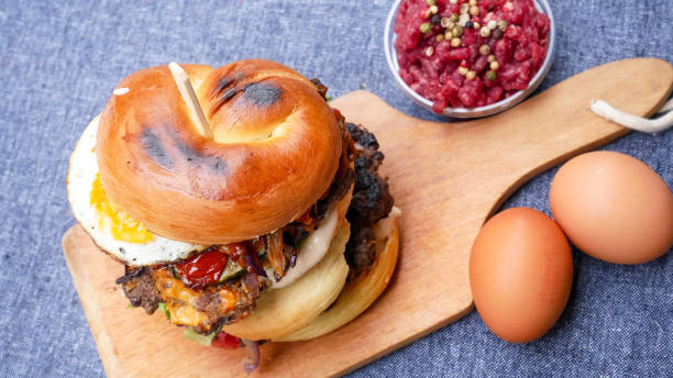 istock Meaty hamburger in a restaurant 1190383974