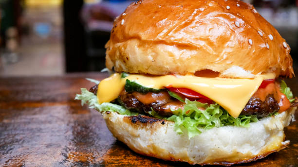 istock Meaty hamburger in a restaurant 1190384057