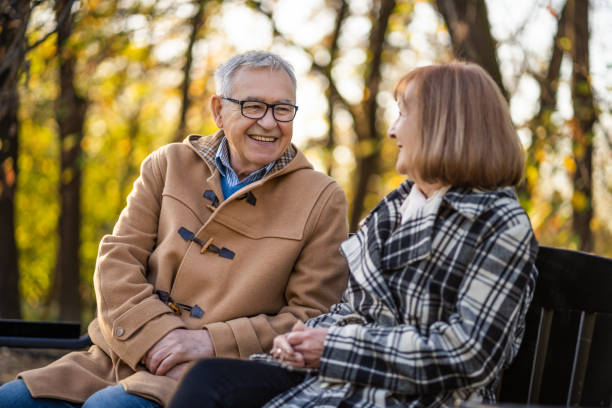 istock Seniors in park in autumn 1190384268
