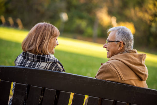istock Seniors in park in autumn 1190385207