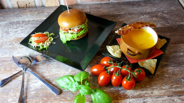 istock Meaty hamburger in a restaurant 1190385439