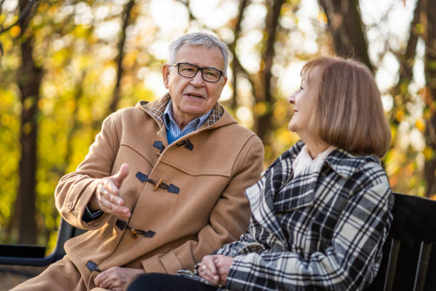 istock Seniors in park in autumn 1190385553