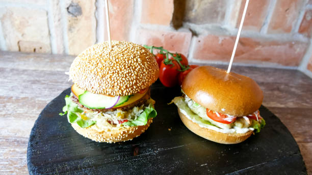 istock Meaty hamburger in a restaurant 1190385695