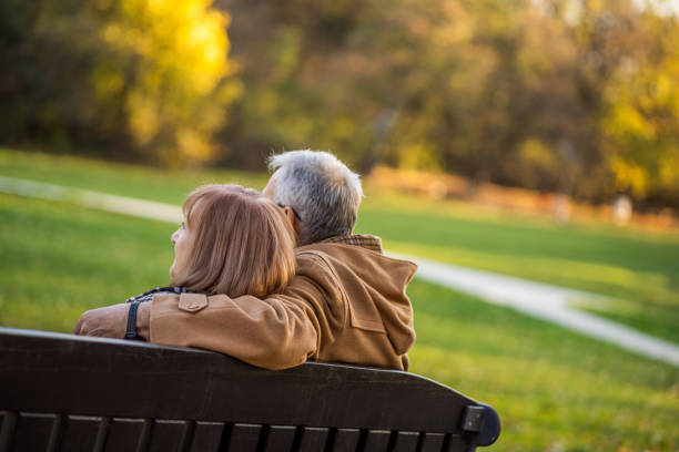 istock Seniors in park in autumn 1190385806