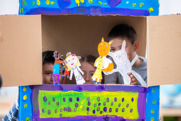 istock Children performing paper puppet show 1190388310
