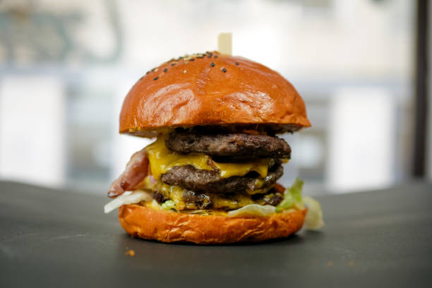 istock Meaty hamburger in a restaurant 1190390651
