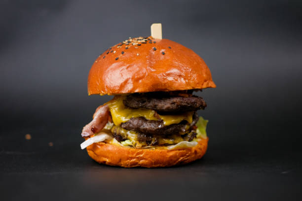 istock Meaty hamburger in a restaurant 1190390656