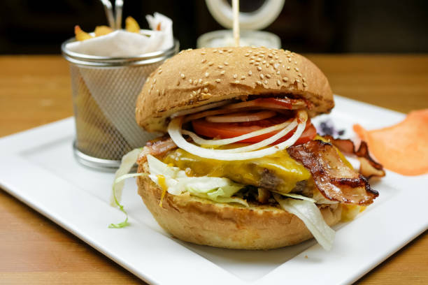 istock Meaty hamburger in a restaurant 1190390733