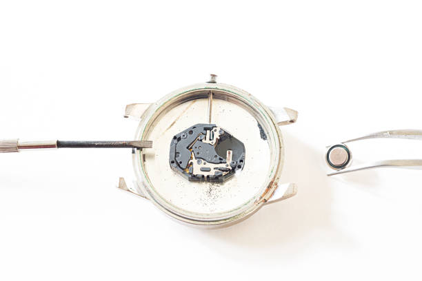 istock Cleaning and repairing a watch 1190392405