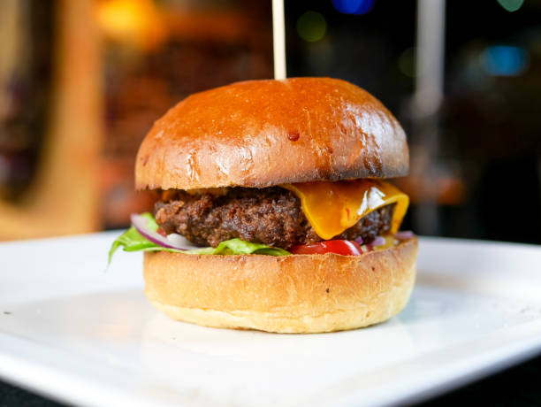 istock Meaty hamburger in a restaurant 1190392924