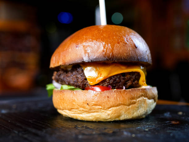 istock Meaty hamburger in a restaurant 1190392944