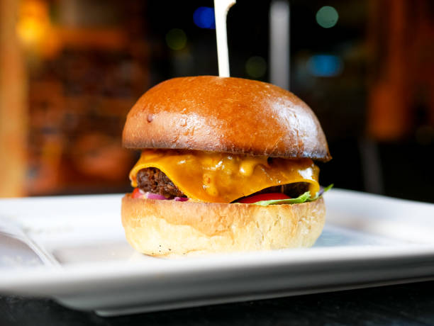 istock Meaty hamburger in a restaurant 1190392946