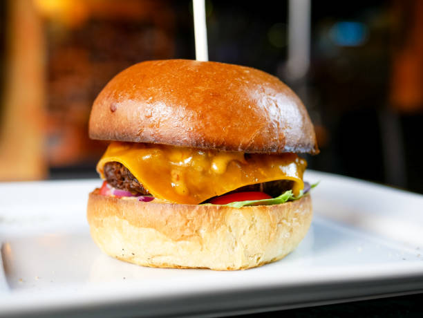 istock Meaty hamburger in a restaurant 1190392948