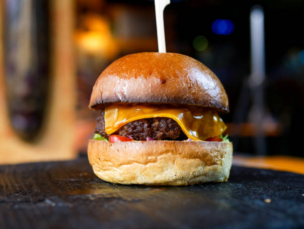 istock Meaty hamburger in a restaurant 1190392961
