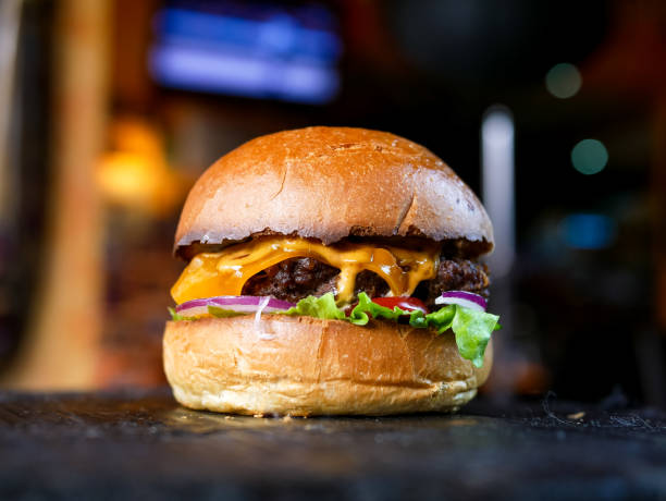 istock Meaty hamburger in a restaurant 1190393042
