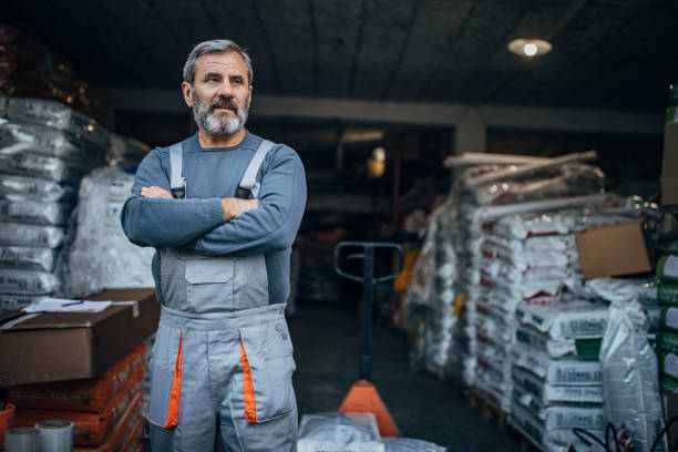istock Man standing in the warehouse 1190398083
