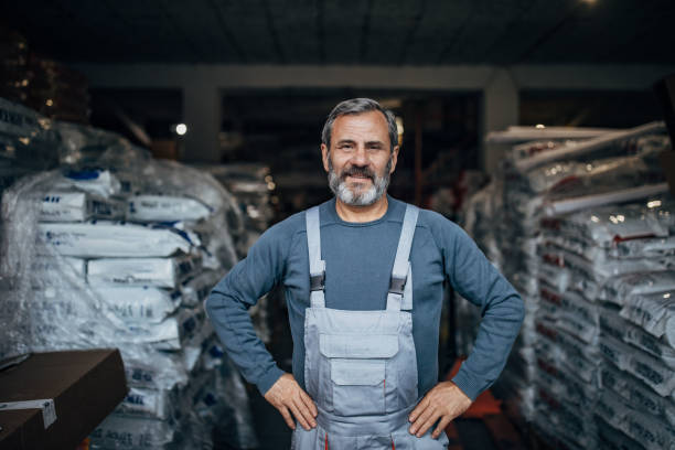 istock Happy man in the warehouse 1190398104