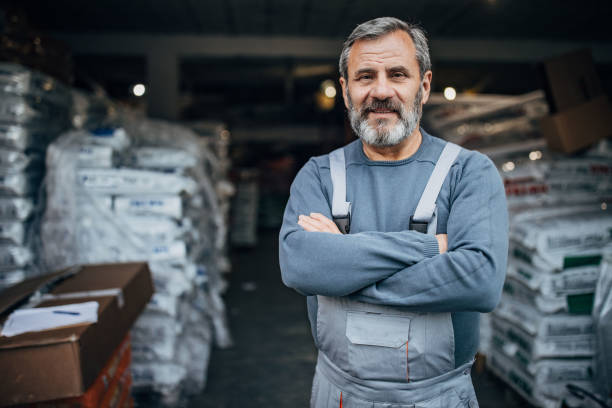 istock Man in the warehouse hangar 1190398191