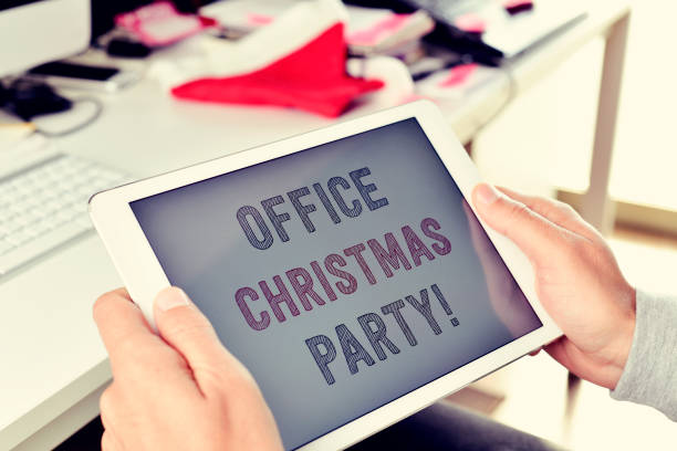istock text office christmas party on a tablet 1190399044