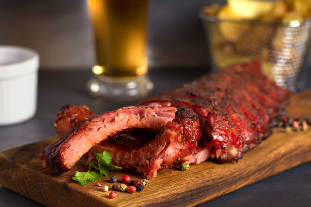 istock Pork loin ribs served on chopping board 1190400129