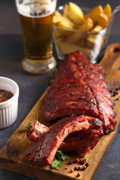 istock Pork loin ribs served on chopping board 1190400285