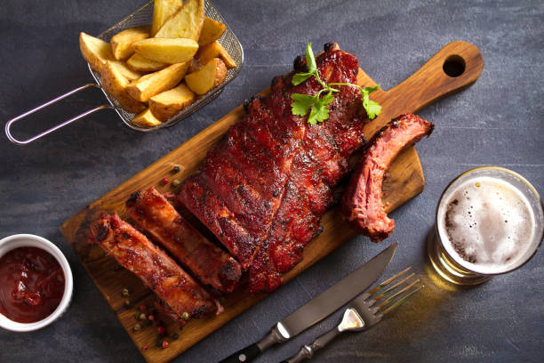 istock Pork loin ribs served on chopping board 1190400314