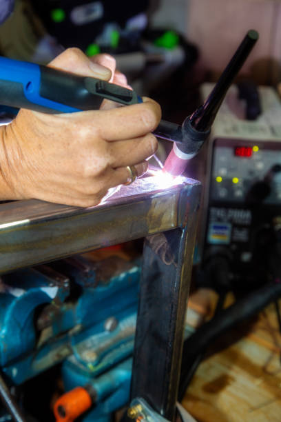 istock Female TIG welder 1190406967