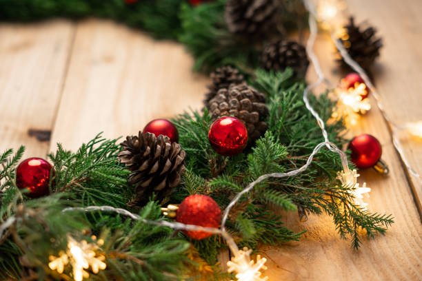 istock Christmas - Pine cones and branches  On the wood 1190407367