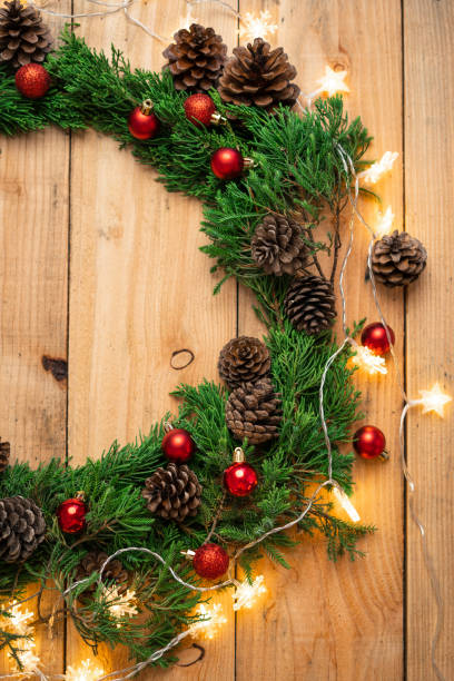 istock Christmas - Pine cones and branches  On the wood 1190407990