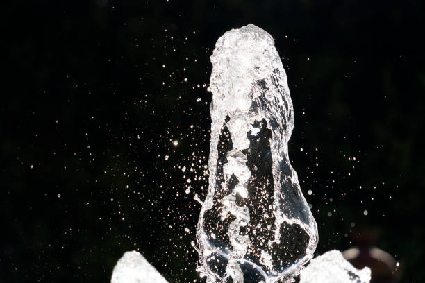 istock fountain splash water detail close up 1190408067