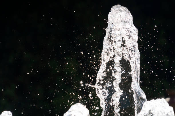 istock fountain splash water detail close up 1190408099