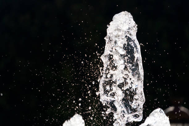 istock fountain splash water detail close up 1190408134