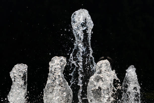 istock fountain splash water detail close up 1190408170