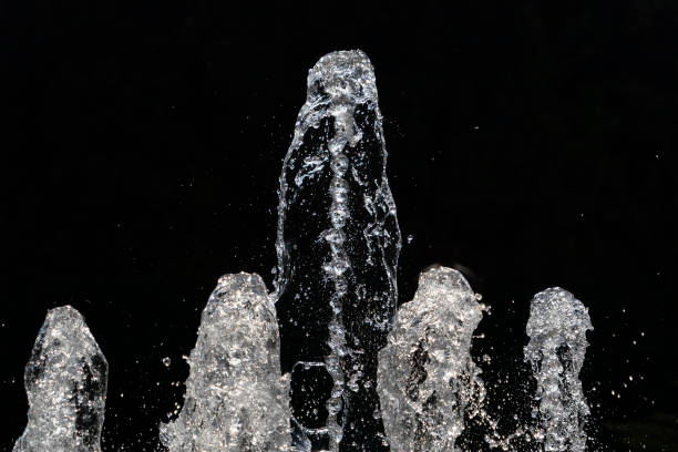 istock fountain splash water detail close up 1190408255